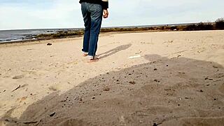 Busty Brunette Takes Cock on Beach