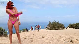 She strips naked flashing shaved pussy clit piercing on beach streets