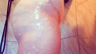 hey milf gets soaked in shower while rubbing her big tits