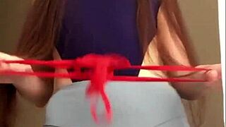 Cute brunette dances in miniskirt, flashing small tits and pretty trimmed pussy in thong leggings