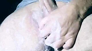imagine catching this naked stud soaping up his huge cock in the steamy shower