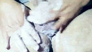 imagine catching this naked stud soaping up his huge cock in the steamy shower