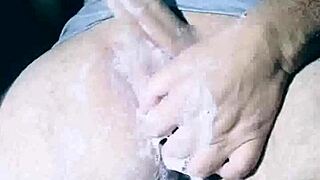 imagine catching this naked stud soaping up his huge cock in the steamy shower