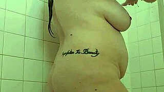 Domme mommy's naked curves glisten in steamy shower demanding total submission