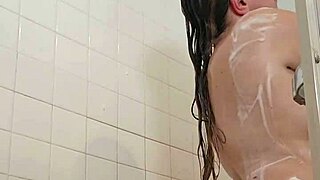 Domme mommy's naked curves glisten in steamy shower demanding total submission