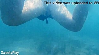 Swimming pool creampie fills her after deep dive