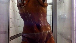 GINGER MILF SOAKS PINK LACE PANTIES IN WET SHOWER PLAY!