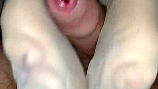 Watch my girlfriend's nylon feet stroke cock to massive cumshot