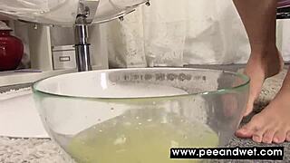 Cute Chick Squirts Pee in Giant Glass Balloon