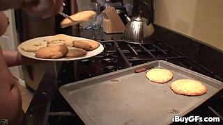 Teen brunette Courtney James fingers wet pussy and licks fingers while baking cookies solo