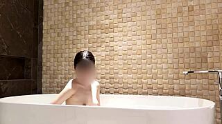 soaking in the tub at a fancy hotel suite