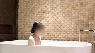 soaking in the tub at a fancy hotel suite