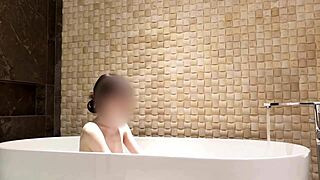 soaking in the tub at a fancy hotel suite