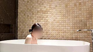 soaking in the tub at a fancy hotel suite