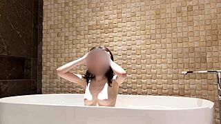 soaking in the tub at a fancy hotel suite