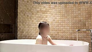 soaking in the tub at a fancy hotel suite