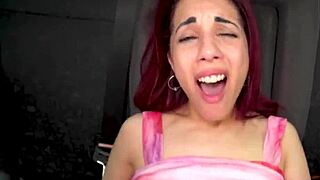 Redhead seductress chokes on monster cock in backseat then rides to cumshot facial