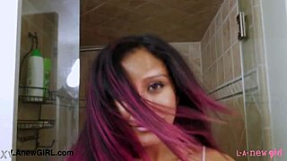 shy brunette with big hair takes a steamy shower