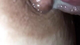 saliva-drenched nipple meets glistening cock head