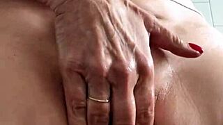 Baby Oil Soaks Brunette Milf's Big Clit Pussy Lips In Wet T-Shirt Striptease Solo