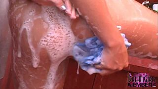 hot brunette shaves her hairless asshole and shaved pussy in outdoor shower