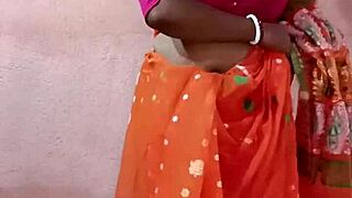 saree-clad curvy indian brunette beauty poses seductively