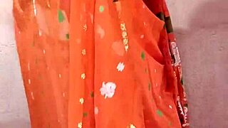 saree-clad curvy indian brunette beauty poses seductively
