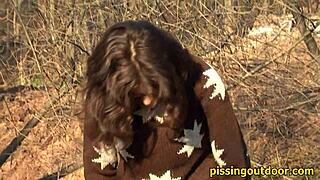 She discovers a secure outdoor spot to unleash her piss fetish