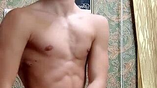 flexible skinny boy bodybuilder stretches after study homemade