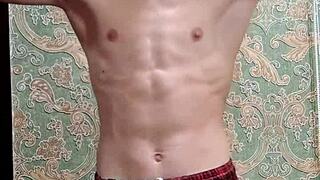 flexible skinny boy bodybuilder stretches after study homemade