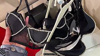 MILF fingers herself dirty-talking in store changing room