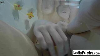 Sexy Nadia Fingers Pussy in Bath with Rubber Duckies