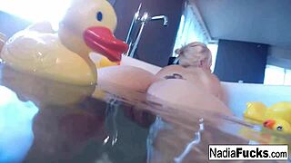 Sexy Nadia Fingers Pussy in Bath with Rubber Duckies