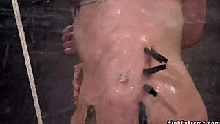 Hogtied brunette screams in painful water bondage fuck