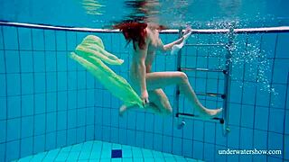 shy russian teen nina's underwater tits tease pool
