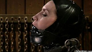 Chained and blindfolded, she's whipped hard in the garage dungeon!