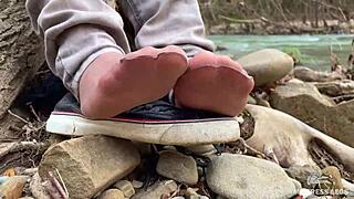 my beautiful nylon feet tease in jeans outdoors