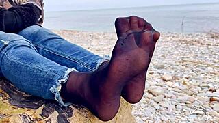 my beautiful nylon feet tease in jeans outdoors