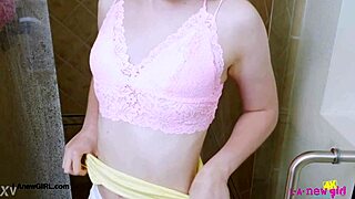 Bright-Eyed Blonde Enjoys Steamy Shower Bath with Refreshing Water Cascade