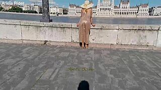 arielarider's sheer dress teases in budapest streets
