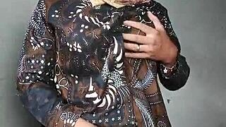 asian hijra ladyboy strokes cock under hijab mysteriously