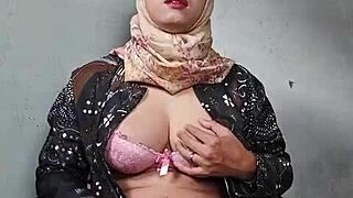 asian hijra ladyboy strokes cock under hijab mysteriously