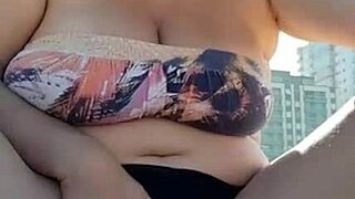 Bold Mature Blonde Squats on Beach Spreading Big Pussy Lips Wide