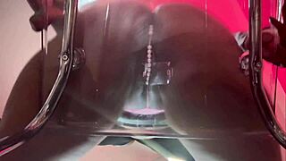 black milf plays with anal toy in panties