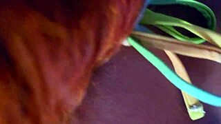 Blonde milf shows off huge ass in green bikini