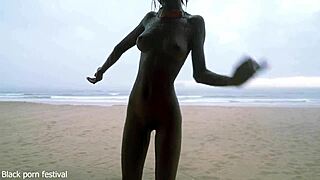 Skinny ebony village girl dancing naked in the rain