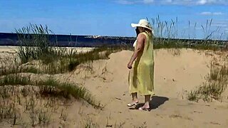 Mommy on beach 3 shows curvy mature exhibitionist