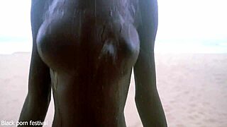 Skinny ebony village girl dancing naked in the rain