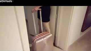 Milf in stockings and heels walks through hotel corridors