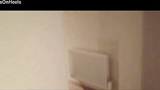 Milf in stockings and heels walks through hotel corridors